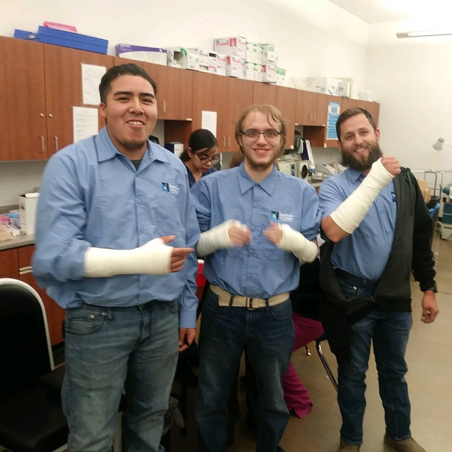 Students showing off practice casts