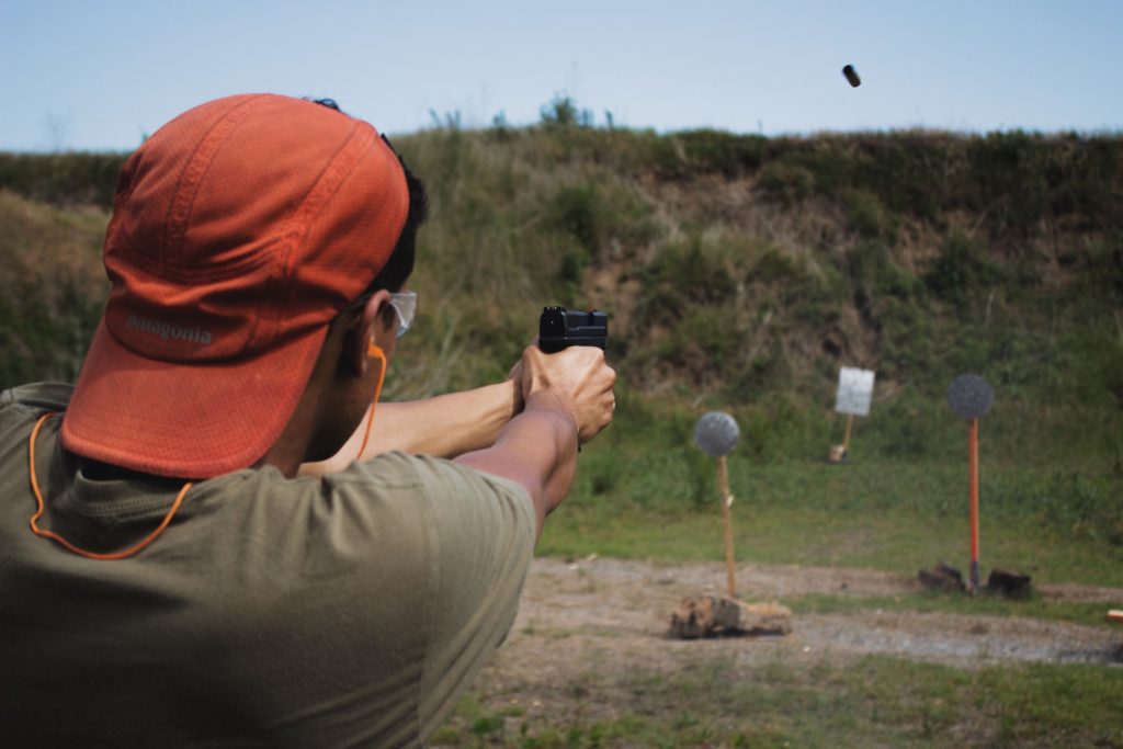 Man shooting targets with a gun